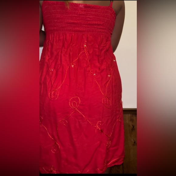 Red Mini Dress. SIZE: No size on dress but fits like a S/M BRAND: Island Planet - Picture 2 of 5
